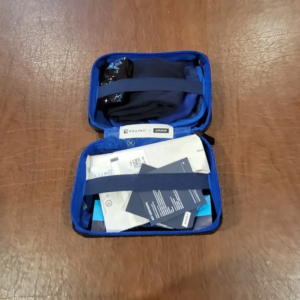 New AWAY Travel The Mini Suitcase Toiletry Case United Polaris Amenity Kit Pouch